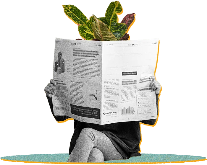 Mulher lendo um jornal